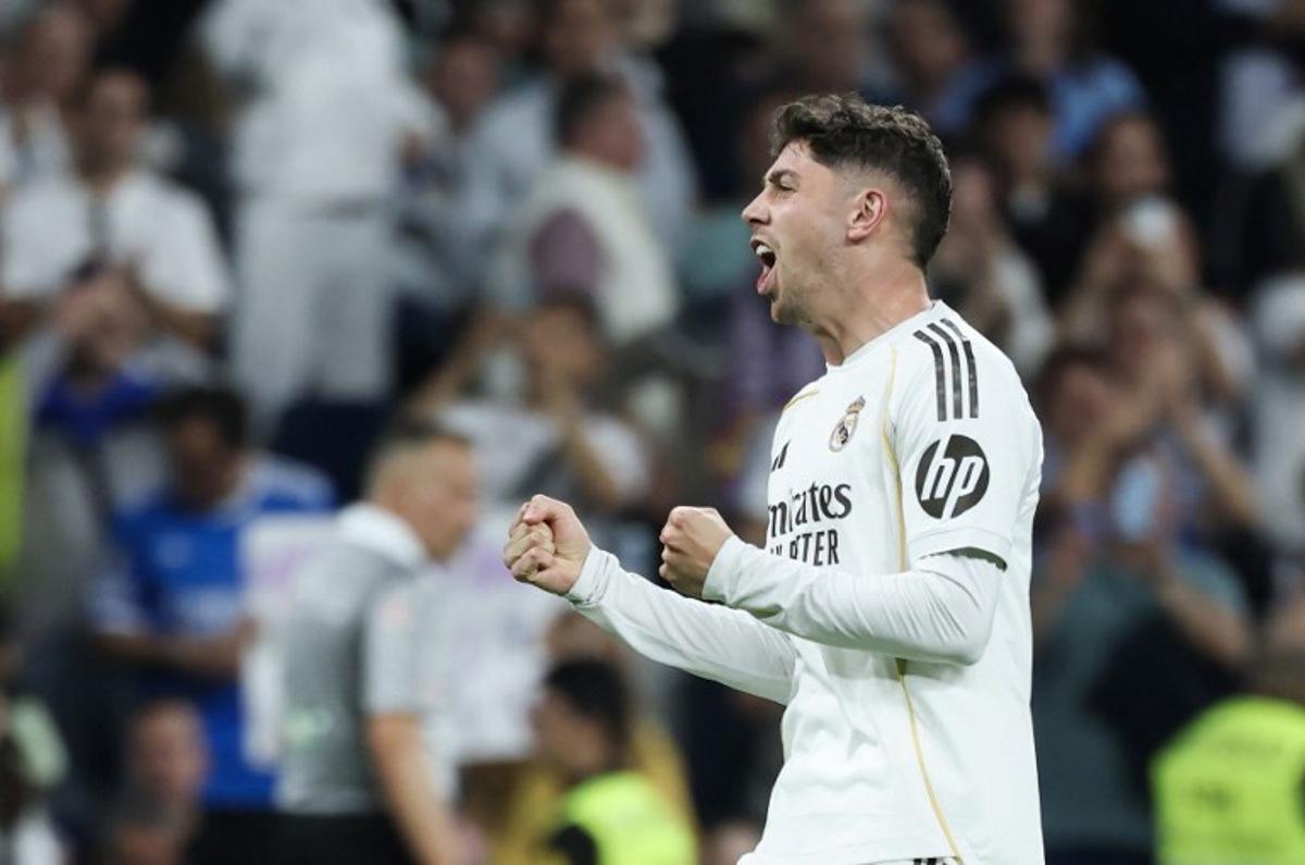 Real Madrid's Uruguayan midfielder #08 Federico Valverde celebrates scoring his team's first goal during the Spanish league football match between Real Madrid CF and Girona FC at the Santiago Bernabeu stadium in Madrid on April 10, 2026. Thomas COEX / AFP