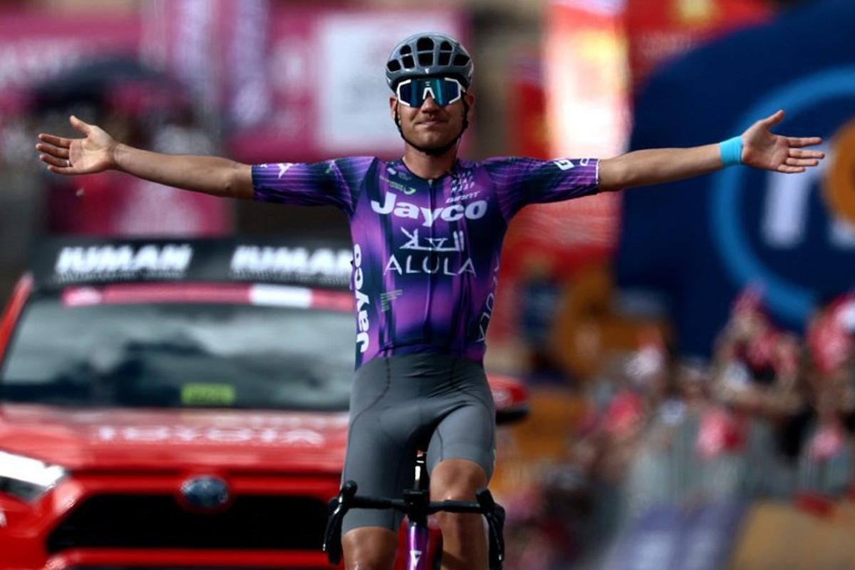 Team Jayco AlUla's Australian rider Luke Plapp celebrates victory as he crosses the finish line of the 8th stage of the 108th Giro d'Italia cycling race of 197kms from Giulianova to Castelraimondo on May 17, 2025. Luca Bettini / AFP