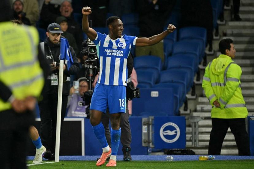 Brighton's English striker #18 Danny Welbeck celebrates after scoring their third goal during the English Premier League football match between Brighton and Hove Albion and Chelsea at the American Express Community Stadium in Brighton, southern England on April 21, 2026. Glyn KIRK / AFP