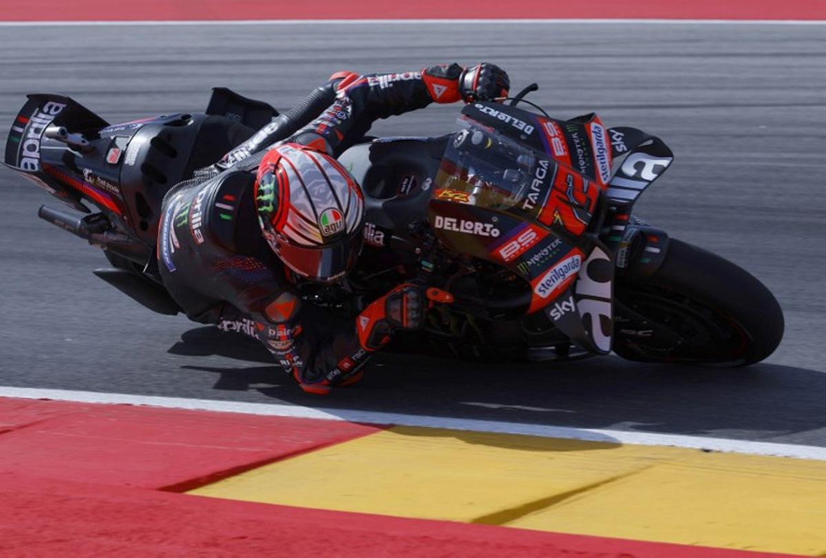 Team Aprilia Racing's Marco Bezzecchi takes a curve during the first free practice at the Motorland circuit in Alcaniz, northeastern Spain, on the eve of the Moto GP Aragon Grand Prix, on August 28, 2026. Pierre-Philippe MARCOU / AFP