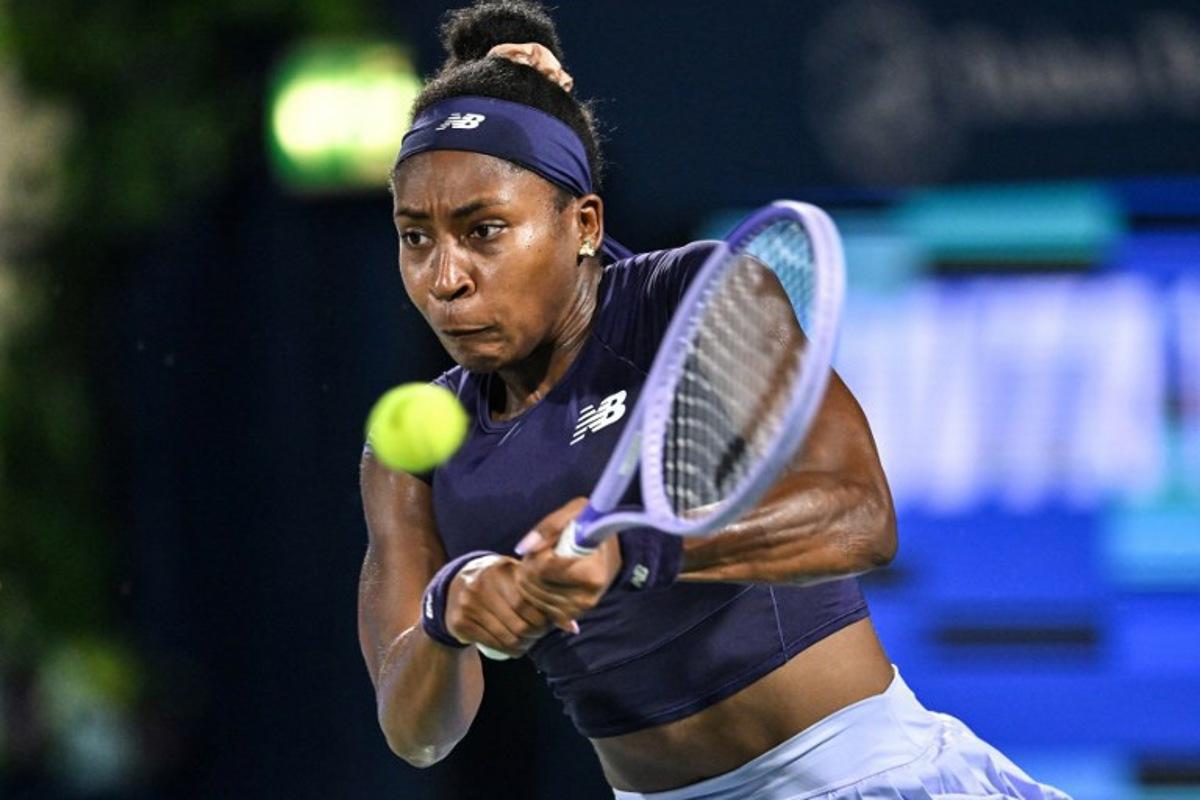 US' Coco Gauff hits a return to Ukraine's Elina Svitolina during their women's singles semi-final match at the Dubai Duty Free Tennis tournament in Dubai on February 20, 2026. Ryan Lim / AFP