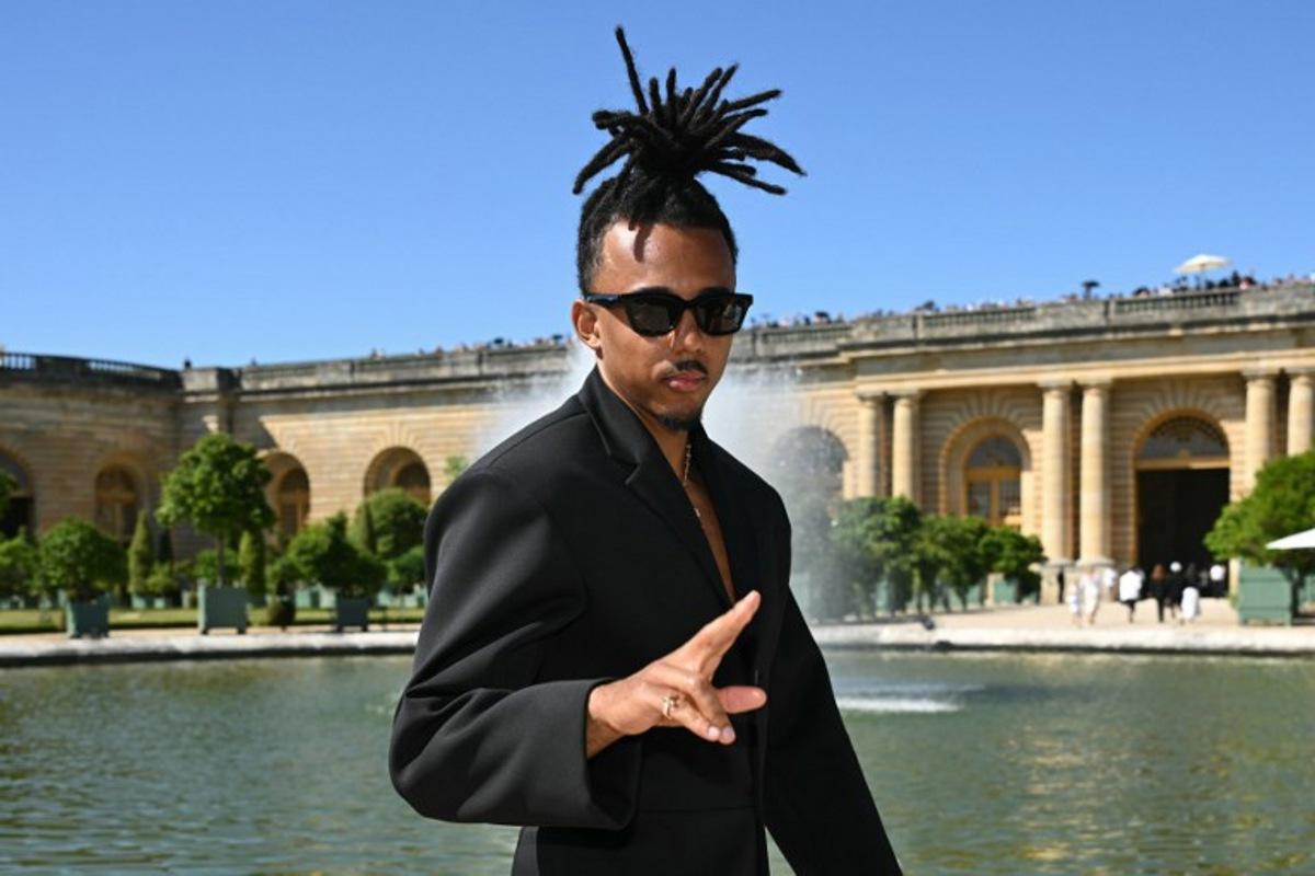 French football player Jules Kounde poses before the Jacquemus Menswear Spring-Summer 2026 collection show as part of the Paris Fashion Week at Orangery of the Palace of Versailles, in Versailles, southwest of Paris, on June 29, 2025. Bertrand GUAY / AFP