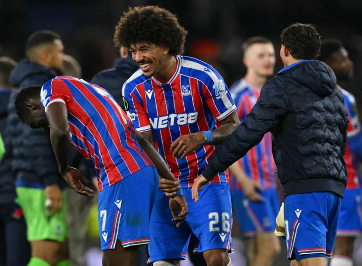 Crystal Palace's Senegalese midfielder #07 Ismaila Sarr (L), Crystal Palace's US defender #26 Chris Richards (C) and Crystal Palace's Spanish midfielder #10 Yeremy Pino celebrate at the full-time whistle during the UEFA Conference semi-final second-leg football match between Crystal Palace and Shakhtar Donetsk at Selhurst Park in London on May 7, 2026. Glyn KIRK / AFP