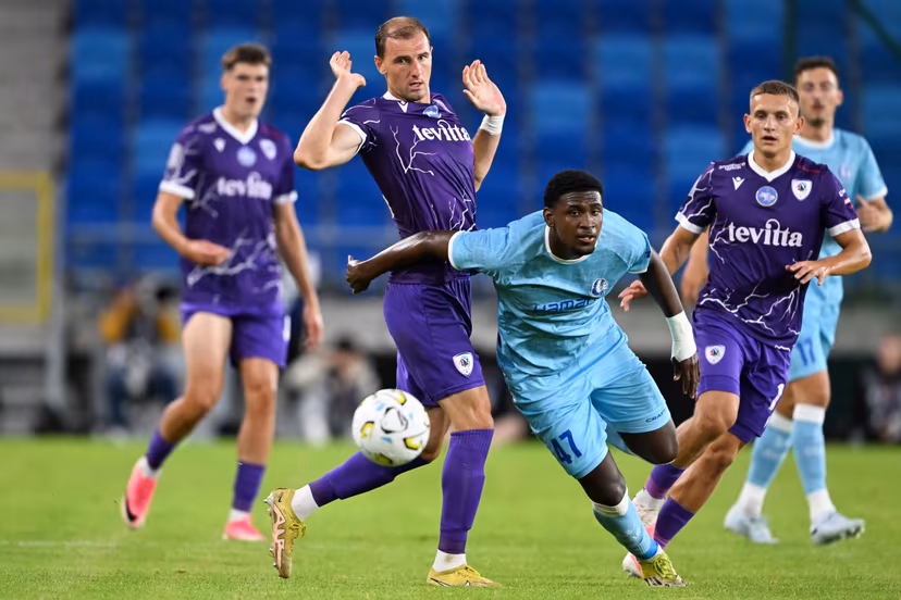 Cherkasy's Nazarii Muravskyi and Gent's Vergara pictured in action during a soccer game between Ukrainian FC LNZ Cherkasy and Belgian KAA Gent, Thursday 23 July 2026 in Plock, Poland, the first leg of the second qualifying round for the UEFA Conference League. BELGA PHOTO JILL DELSAUX