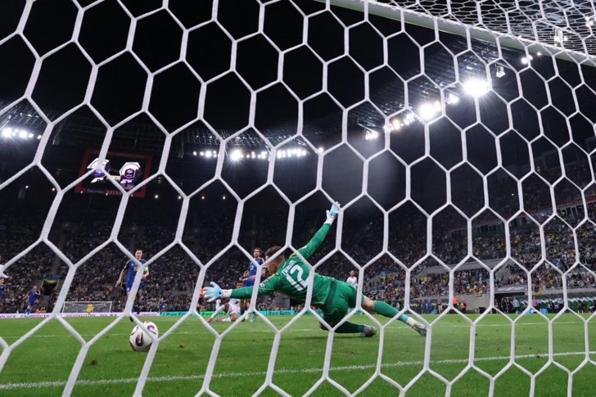 Ukraine's goalkeeper #12 Anatoliy Trubin concedes second goal 0:2 during the 2026 World Cup qualifiers Europe zone group D football match between Ukraine and France, on September 5, 2025 in Wroclaw, Poland. Franck FIFE / AFP