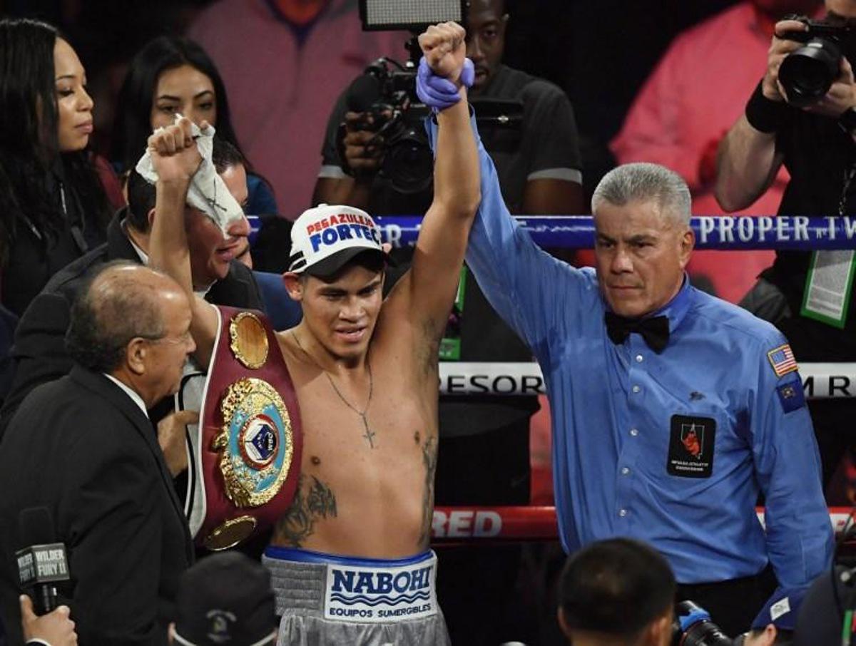 Emanuel Navarrete of Mexico is declared the winner against Jeo Santisima of the Philippines after their Super Bantamweight WBO World Title fight at the MGM Grand Las Vegas in Las Vegas, Nevada on February 22, 2020. Mark RALSTON / AFP