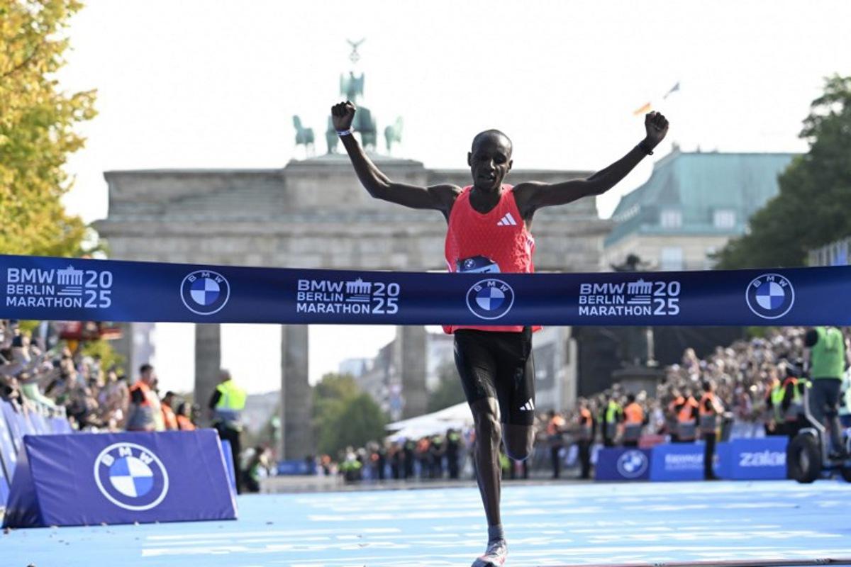 Kenya's Sabastian Sawe crosses the finish line to win the 51st edition of the Berlin Marathon in Berlin, Germany on September 21, 2025. Tobias SCHWARZ / AFP