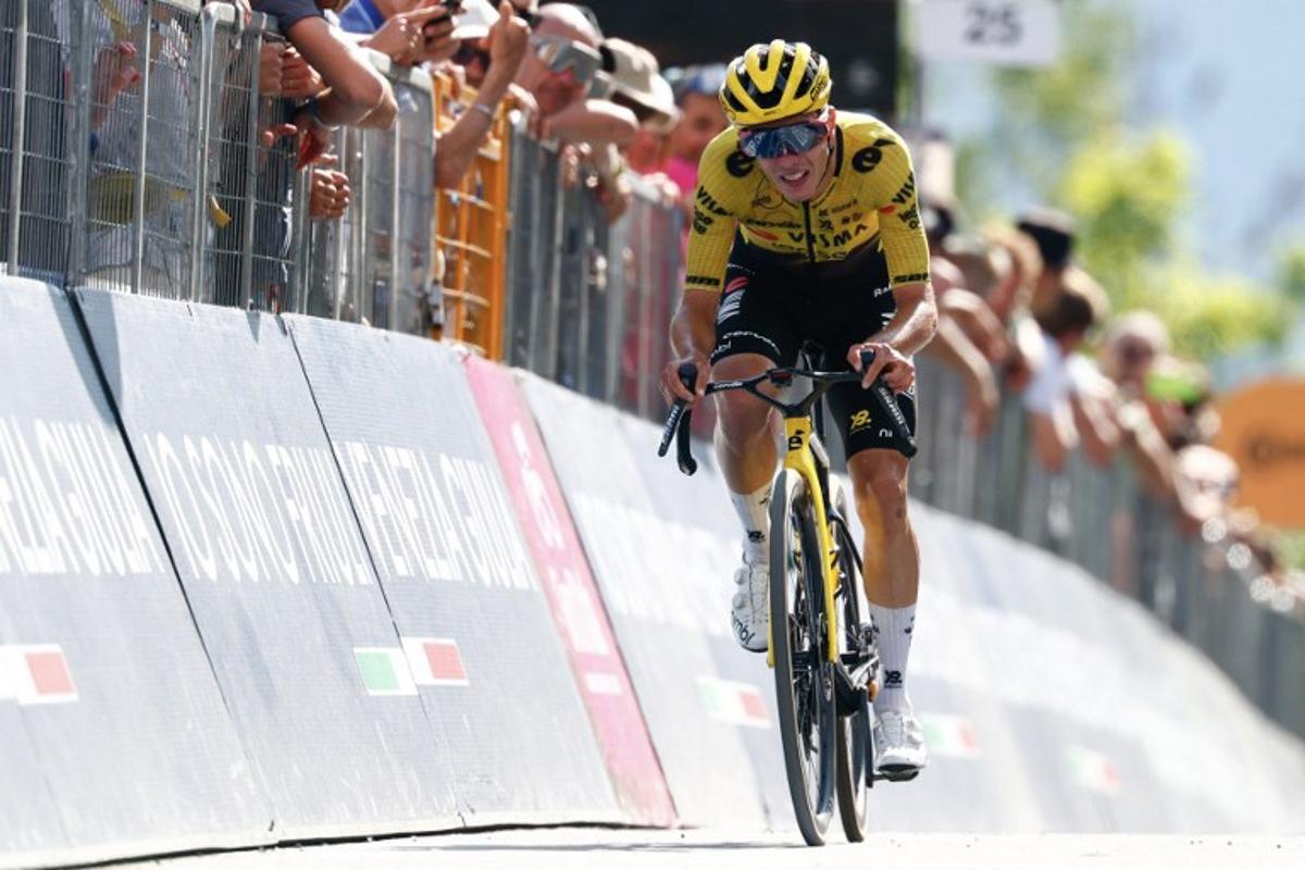Team Visma Lease a Bike Italian rider Davide Piganzoli crosses the finish line of the 19th stage of the Giro d'Italia 2026 - Tour of Italy cycling race between Feltre and Alleghe, Italy, on May 29, 2026. Luca Bettini / AFP
