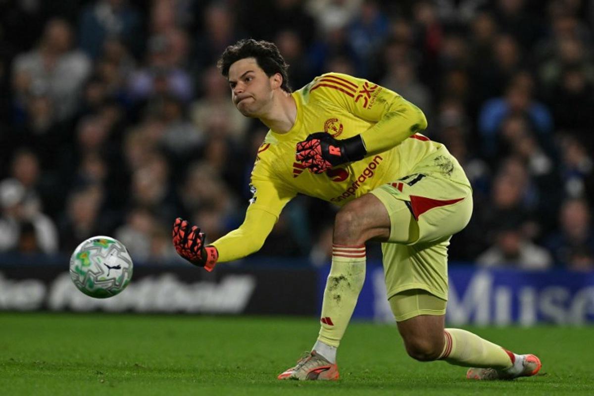 Manchester United's Belgian goalkeeper #31 Senne Lammens rolls the ball out during the English Premier League football match between Chelsea and Manchester United at Stamford Bridge in London on April 18, 2026. Glyn KIRK / AFP