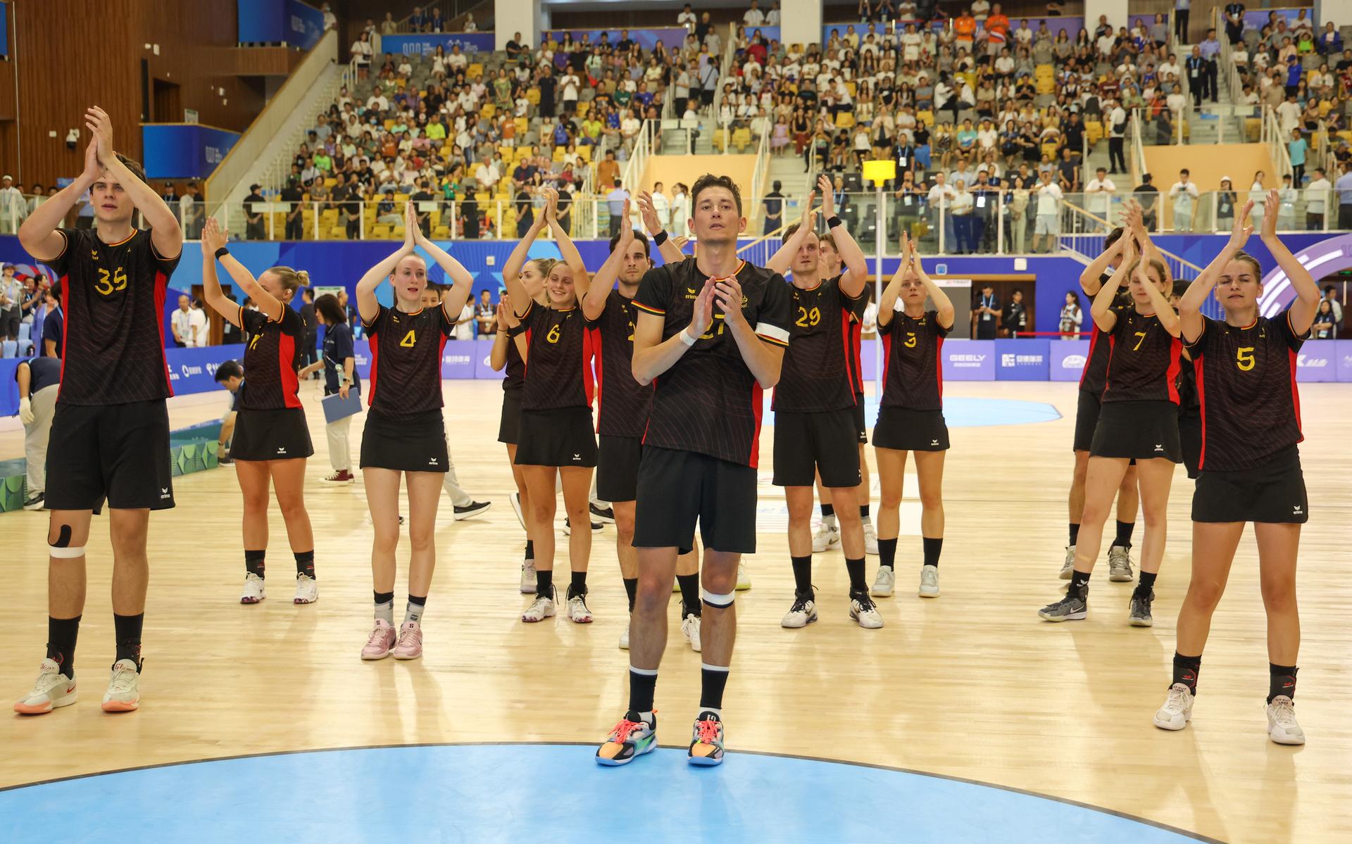 belgian team players pictured after a game against the Netherlands in the final of the Korfball competition of the World Games 2025, in Chenghdu, China, on Tuesday 12 August 2025. This year, the World Games take place from 07 to 17 augustus. BELGA PHOTO VIRGINIE LEFOUR