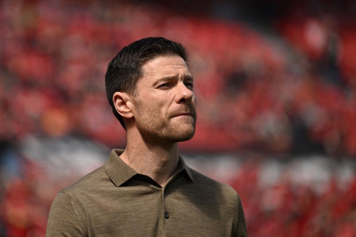 Bayer Leverkusen's Spanish head coach Xabi Alonso arrives prior to the German first division Bundesliga football match between Bayer 04 Leverkusen and FC Augsburg in Leverkusen, western Germany on April 26, 2025. INA FASSBENDER / AFP