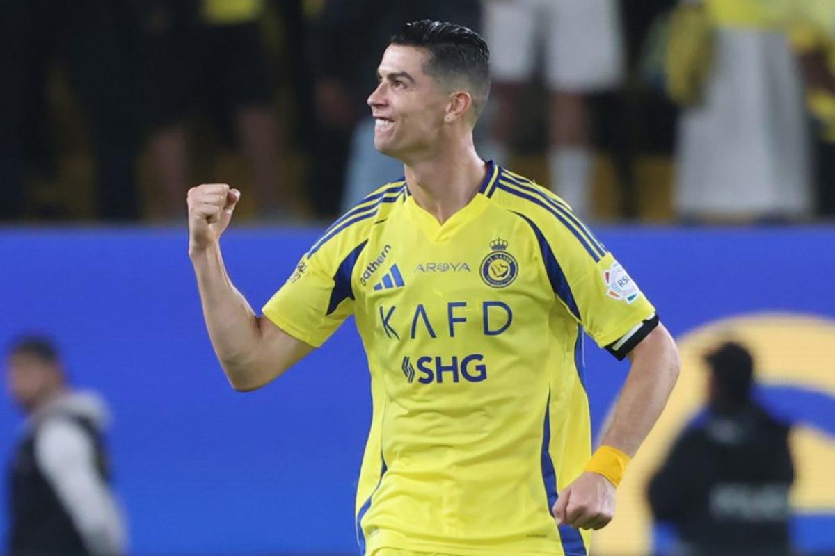 Nassr's Portuguese forward #7 Cristiano Ronaldo celebrates scoring his team's second goal during the Saudi Pro League football match between Al-Nassr and Al-Shabab at Al-Awwal Park in Riyadh on March 7, 2025. Fayez NURELDINE / AFP