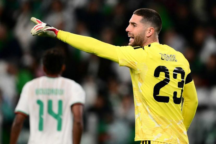Algeria's goalkeepers #23 Luca Zidane (R) gestures during the friendly international football match between Algeria and Uruguay at the Allianz Stadium in Turin on March 31, 2026. MARCO BERTORELLO / AFP