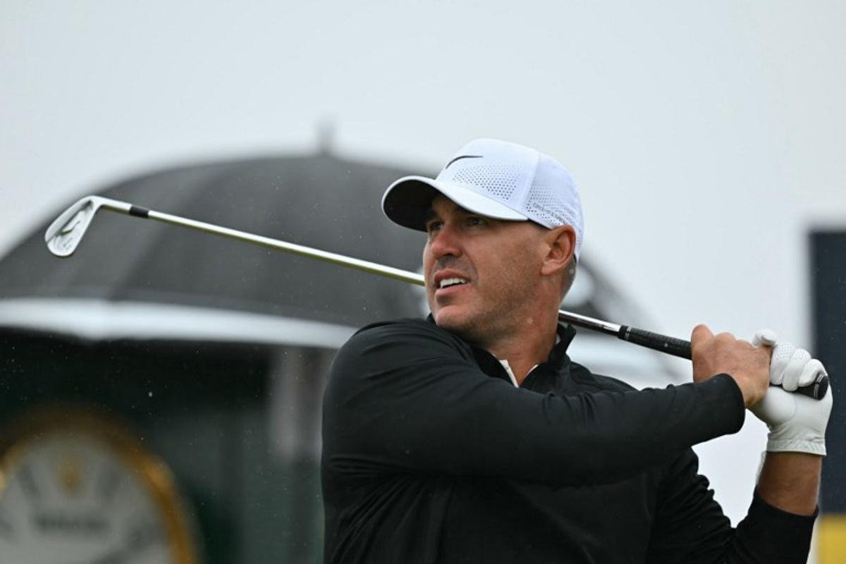 US golfer Brooks Koepka watches his iron shot from the 3rd tee during his third round, on day three of the 152nd British Open Golf Championship at Royal Troon on the south west coast of Scotland on July 20, 2024. Glyn KIRK / AFP