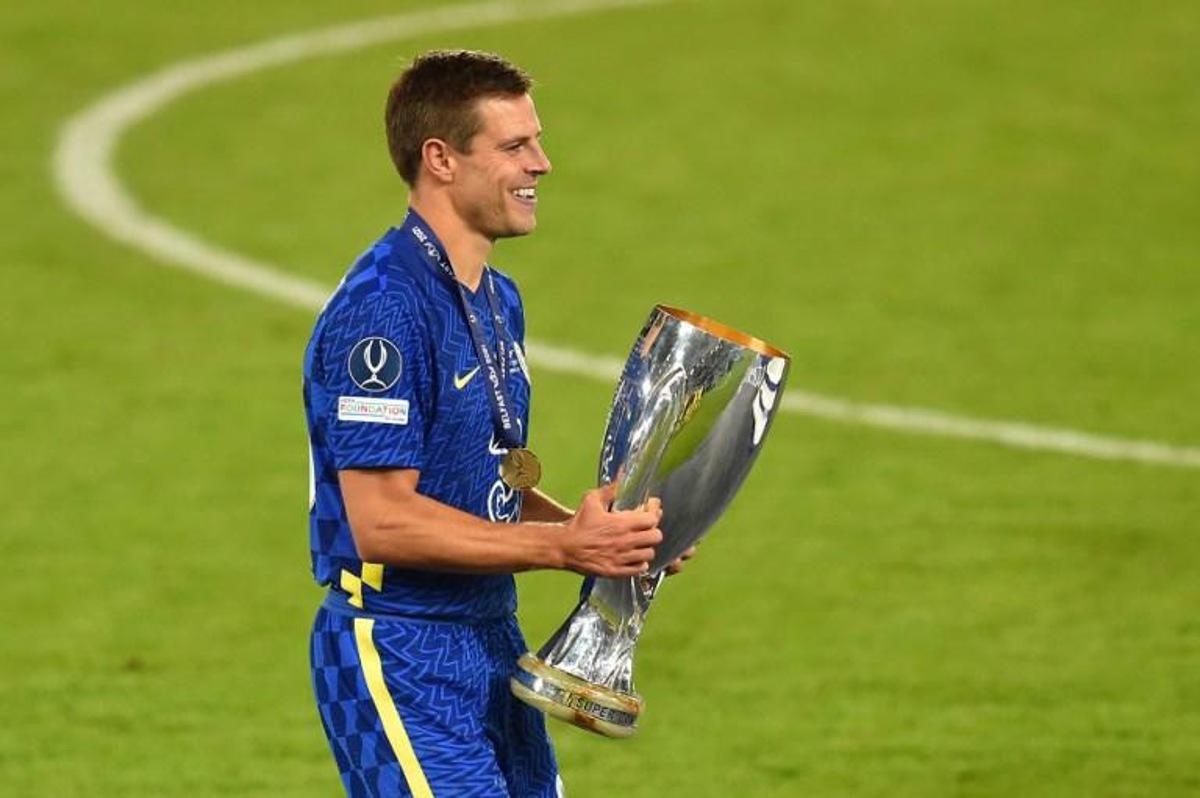 Chelsea's Spanish defender Cesar Azpilicueta collects the trophy during the presentation ceremony after Chelsea won the UEFA Super Cup football match between Chelsea and Villarreal at Windsor Park in Belfast on August 11, 2021. Paul ELLIS / AFP