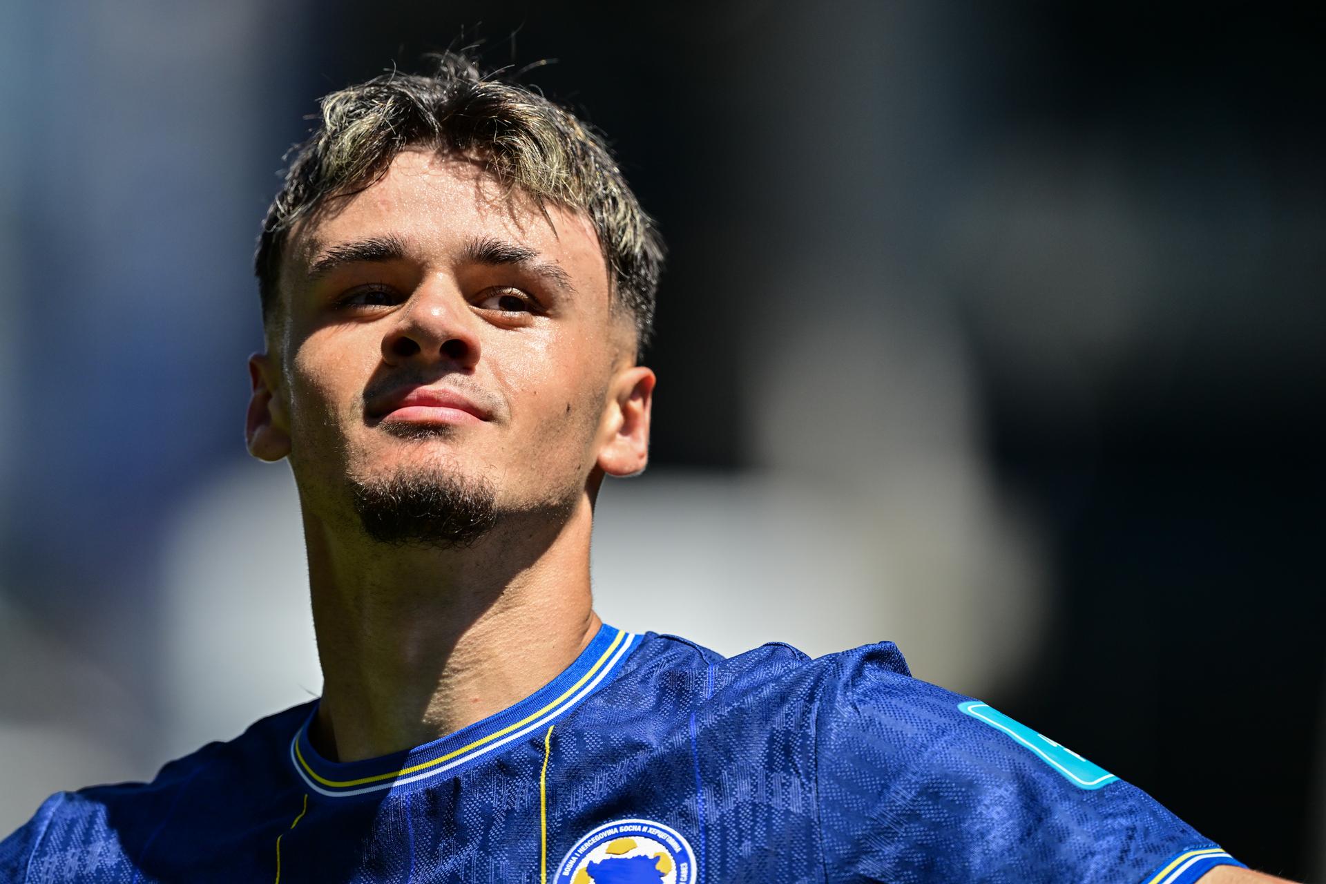 Bosnia and Herzegovina's Kerim Alajbegovic celebrates after scoring during a soccer game between Bosnia and Herzegovina and Qatar, on Wednesday 24 June 2026 in Seattle, the third and last day in the group stage, in group B of the FIFA World Cup 2026 in the United States of America. BELGA PHOTO DIRK WAEM