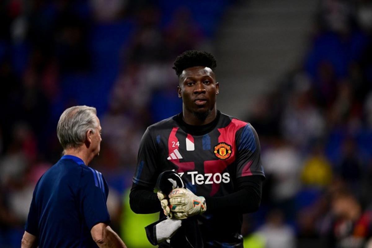 Manchester United's Cameroonian goalkeeper #24 Andre Onana looks on during the UEFA Europa League Quarter final first leg football match between Olympique Lyonnais (OL) and Manchester United at the Parc Olympique Lyonnais Groupama stadium in Decines-Charpieu, central-eastern France, on April 10, 2025. Olivier CHASSIGNOLE / AFP