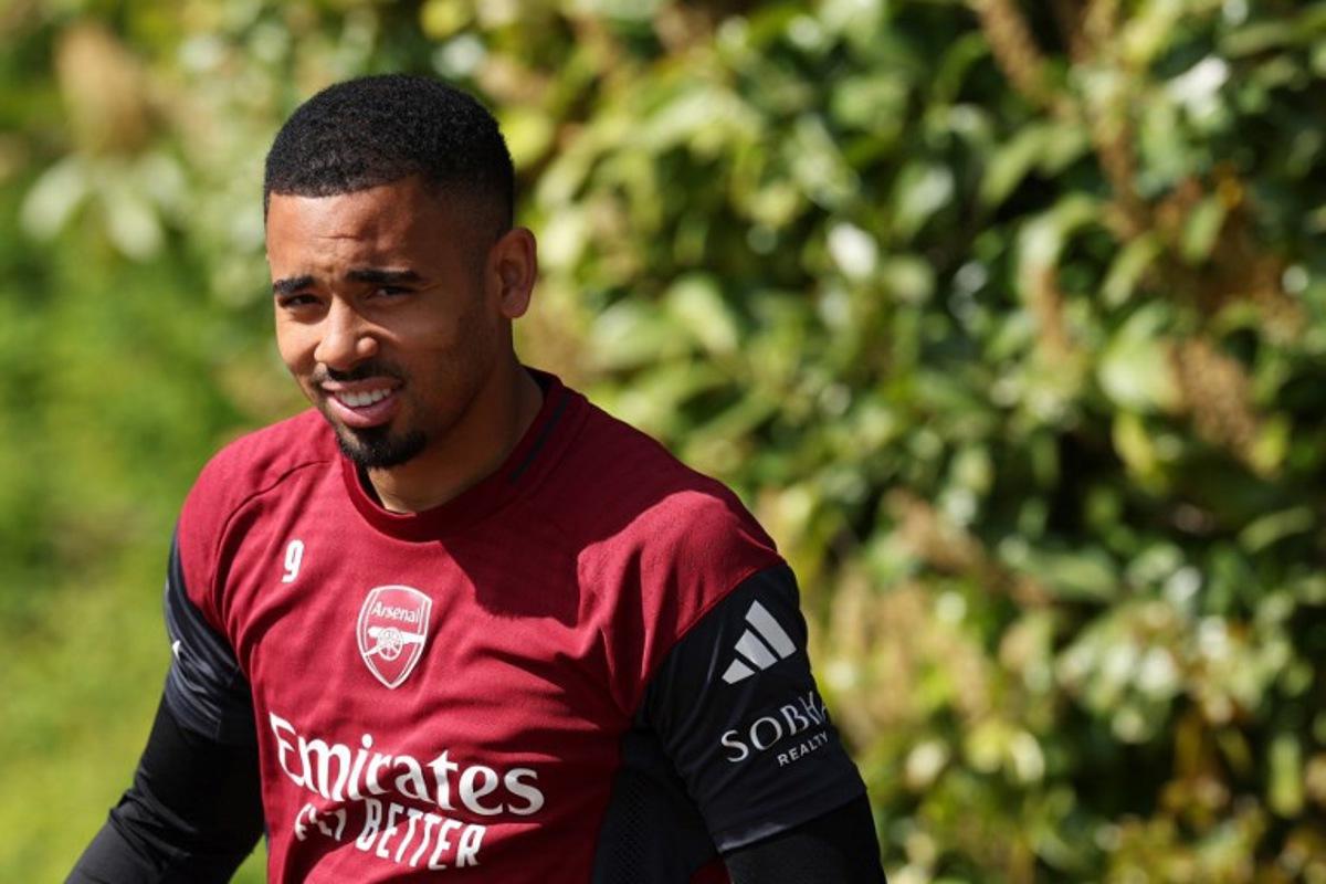 Arsenal's Brazilian striker #09 Gabriel Jesus arrives to take part in a team training session at London Colney, north of London, on April 14, 2026, on the eve of their UEFA Champions League, quarter-final, second-leg football match against Sporting Lisbon. Adrian Dennis / AFP