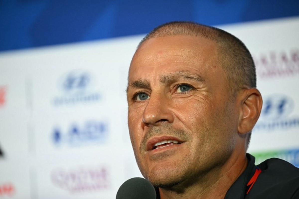 Uzbekistan's Italian head coach Fabio Cannavaro gives a press conference on the eve of Uzbekistan's 2026 World Cup football tournament Group H football match against Portugal in Houston on June 22, 2026. RONALDO SCHEMIDT / AFP
