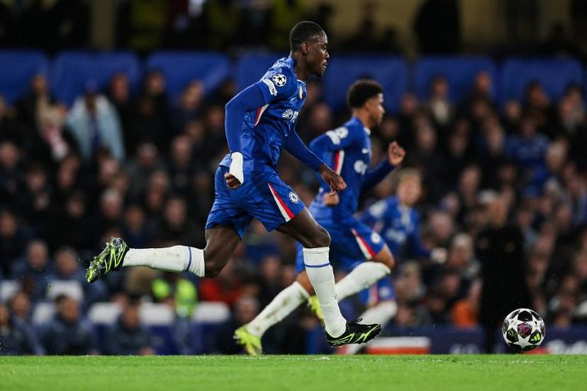 Chelsea's English defender #23 Trevoh Chalobah runs with the ball during the UEFA Champions League round of 16 second leg football match between Chelsea FC and Paris Saint-Germain (PSG) at Stamford Bridge, west London on March 17, 2026. Adrian Dennis / AFP