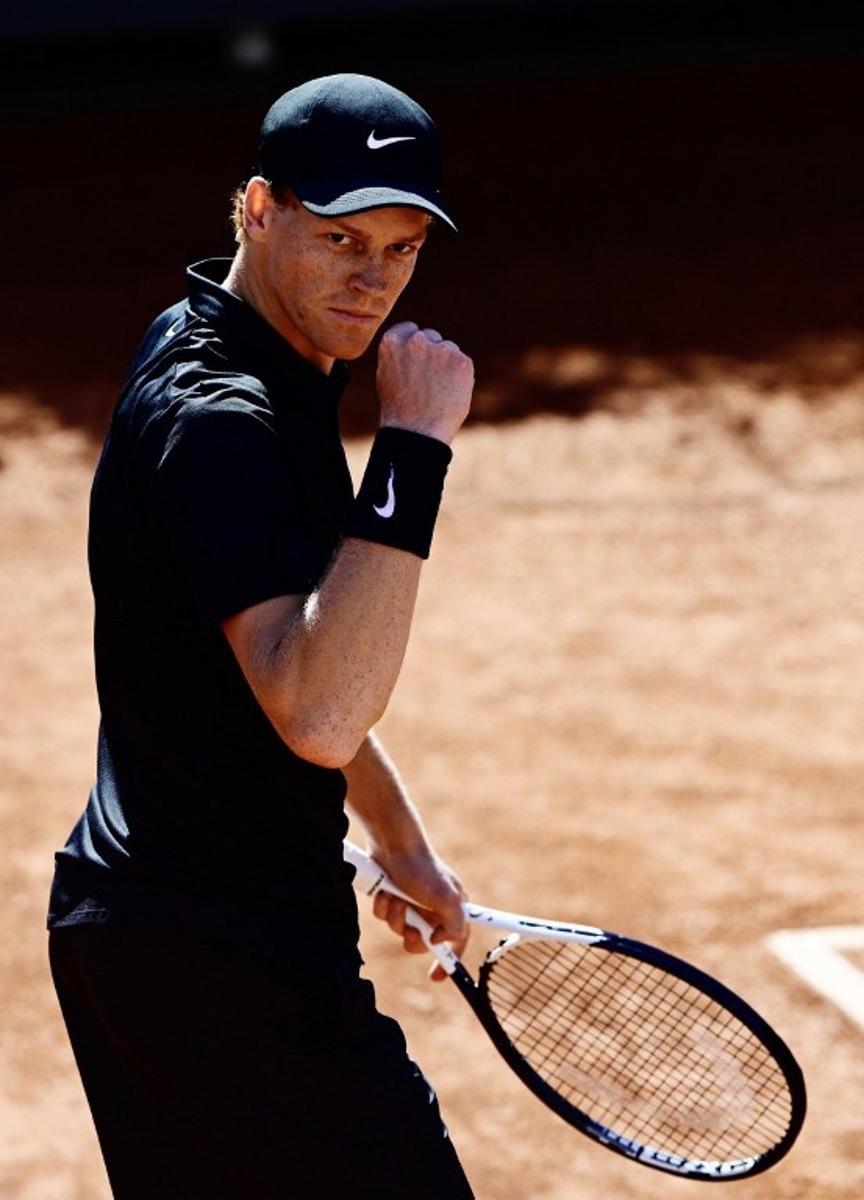 Italy's Jannik Sinner celebrates a point against Australia's Alexei Popyrin during the ATP Rome Open tennis tournament at Foro Italico in Rome on May 11, 2026. Tiziana FABI / AFP