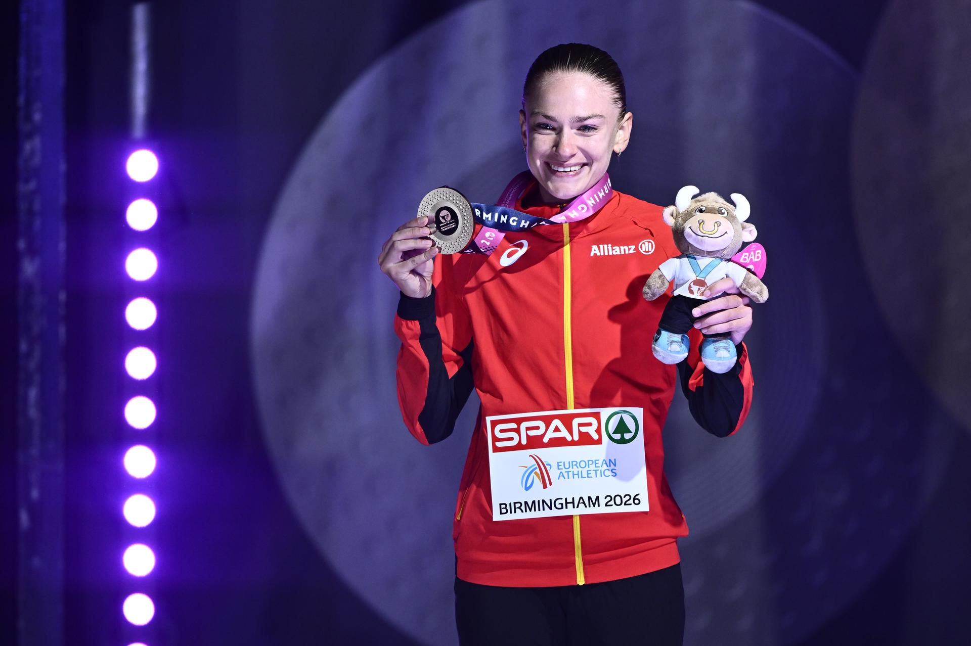 Belgian Jana Van Lent celebrates with the bronze medal at the podium ceremony of the women's 10.000m race, on the fifth day of the European Athletics Championships (August 10-18) in Birmingham, United Kingdom, on Friday 14 August 2026. BELGA PHOTO ERIC LALMAND
