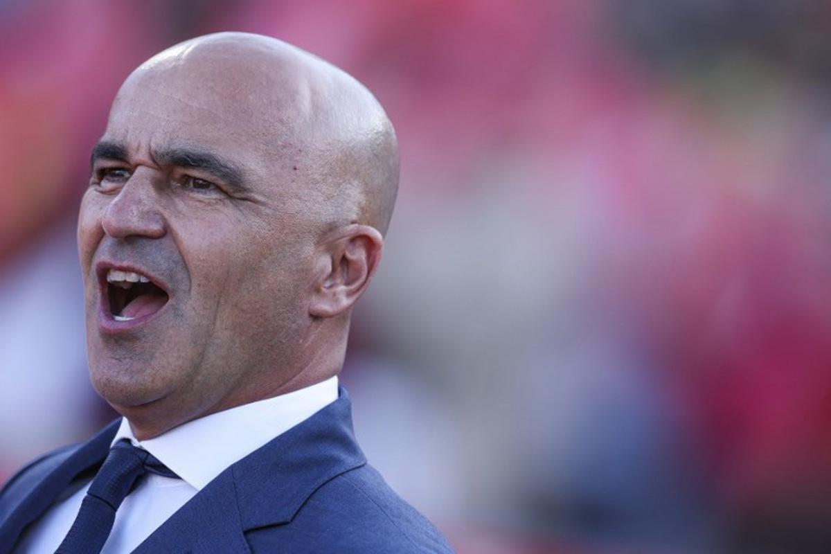 Portugal's Spanish coach Roberto Martinez sings the national anthem before the international friendly football match between Portugal and Chile at Estadio Nacional do Jamor in Oeiras, on June 6, 2026. PATRICIA DE MELO MOREIRA / AFP