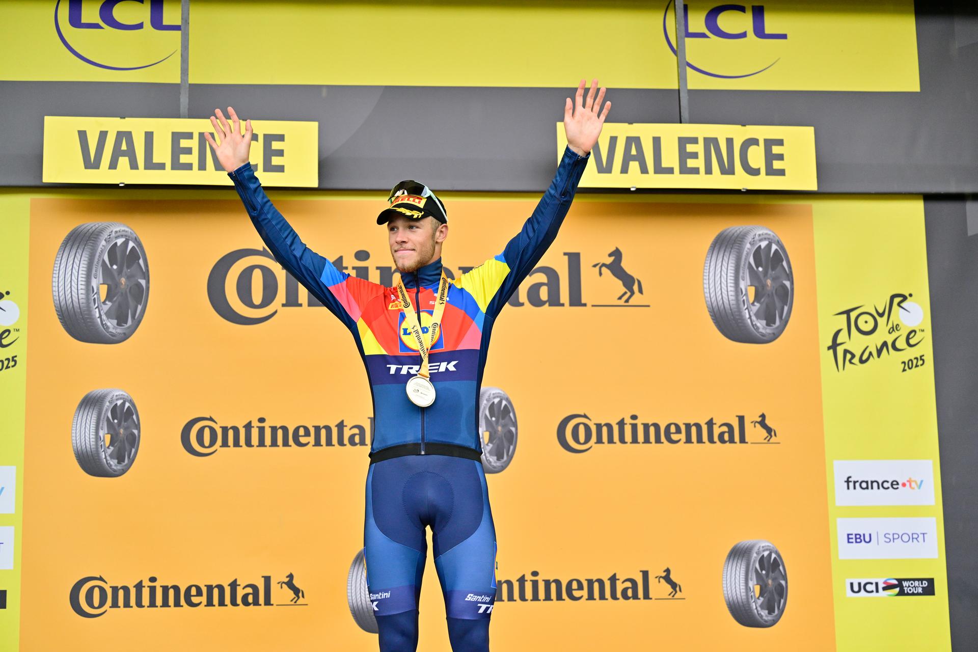 Italian Jonathan Milan of Lidl-Trek celebrates on the podium after winning stage 17 of the 2025 Tour de France cycling race, from Bollene to Valence (161km), on Wednesday 23 July 2025 in France. The 112th edition of the Tour de France starts on Saturday 5 July in Lille, France, and will finish in Paris, France on the 27th of July. BELGA PHOTO DIRK WAEM