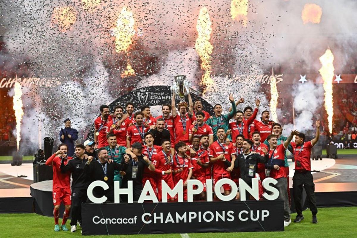 Toluca's midfielder #14 Marcel Ruiz lifts the trophy next to teammates after winning the CONCACAF Champions Cup final football match between Mexico's Toluca and Tigres UANL at the Nemesio Diaz stadium in Toluca, Mexico on May 30, 2026. Mario Vazquez / AFP